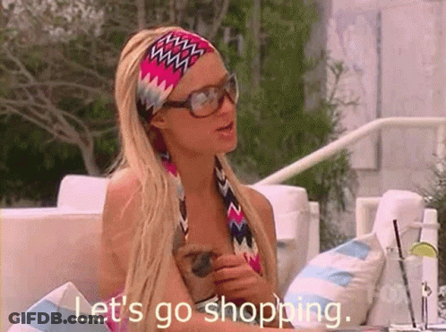A Woman Wearing Sunglasses And A Headband Says Let 'S Go Shopping . GIF