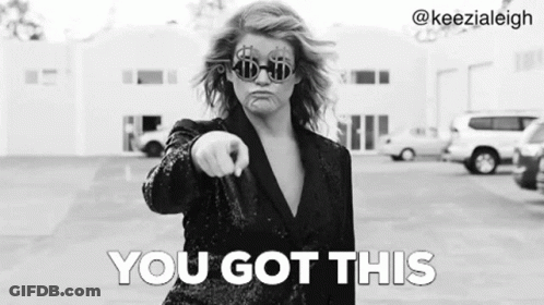 A Woman Wearing Sunglasses And A Suit Is Pointing At The Camera And Says `` You Got This '' . GIF