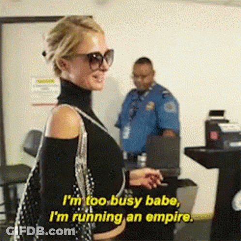 A Woman Wearing Sunglasses And A Turtleneck Says I 'M Too Busy Babe I 'M Running An Empire GIF