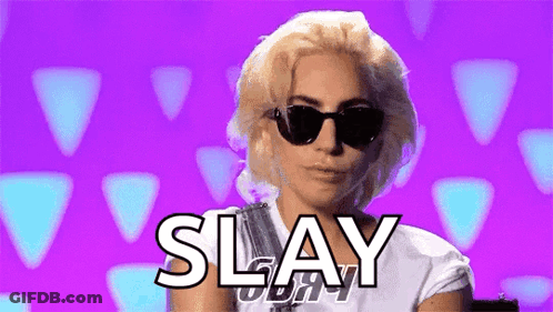 A Woman Wearing Sunglasses And A White Shirt Is Standing In Front Of A Purple Background And Says Slay . GIF