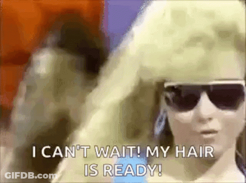 A Woman Wearing Sunglasses And A Wig Says `` I Can 'T Wait My Hair Is Ready ! '' GIF
