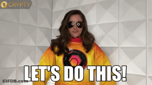 A Woman Wearing Sunglasses And A Yellow Sweatshirt Says Let 'S Do This GIF