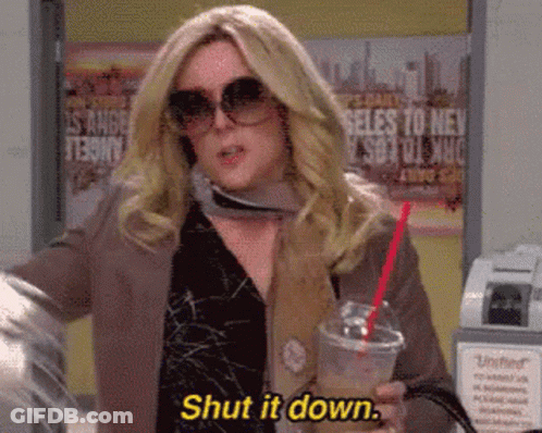 A Woman Wearing Sunglasses Is Holding A Drink And Says Shut It Down GIF