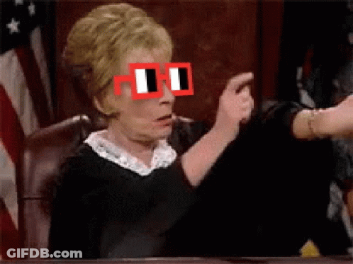 Woman Wearing Sunglasses Sitting At Table With Another Woman GIF