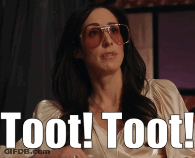 A Woman Wearing Sunglasses Says " Toot Toot " In White Letters GIF