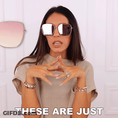 A Woman Wearing Sunglasses With The Words These Are Just Above Her GIF