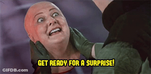 A Woman With A Bald Head Is Being Examined By A Doctor And The Words Get Ready For A Surprise Are Above Her GIF