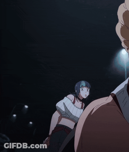 A Woman With A Bandaged Mouth Is Standing Next To Another Woman GIF