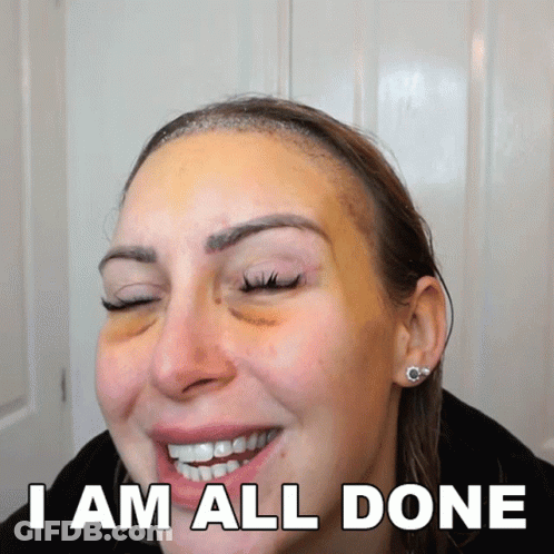 A Woman With A Black Eye Smiles With The Words " I Am All Done " Behind Her GIF