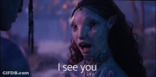 A Woman With A Blue Face Is Talking To A Man With The Words I See You Above Her GIF
