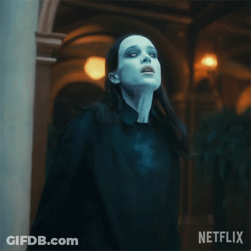A Woman With A Blue Light Coming Out Of Her Chest And A Netflix Logo On The Bottom GIF