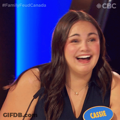 A Woman With A Blue Name Tag That Says Cassie GIF