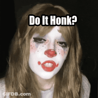 A Woman With A Clown Face Painted On Her Face And The Words Do It Honk GIF