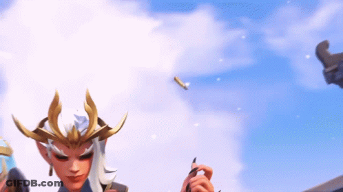 A Woman With A Crown On Her Head Is Holding A Pen In Front Of A Blue Sky . GIF