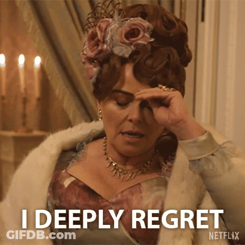 A Woman With A Flower In Her Hair Says I Deeply Regret GIF