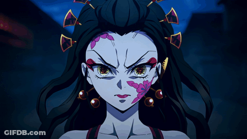 A Woman With A Flower On Her Face Has A Very Angry Look On Her Face GIF