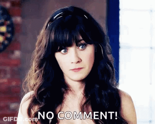 A Woman With A Headband On Her Head Is Making A Face And Saying No Comment . GIF