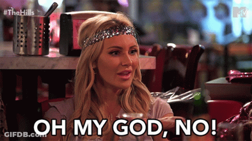 A Woman With A Headband On Her Head Says " Oh My God No " GIF