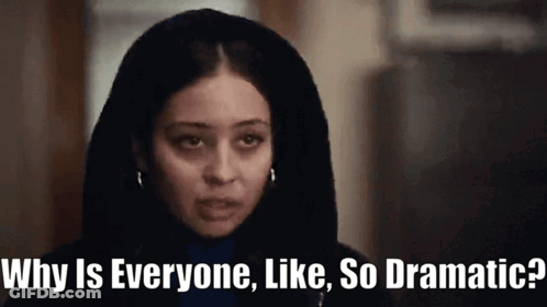 A Woman With A Hood On Her Head Says " Why Is Everyone Like So Dramatic ? " GIF