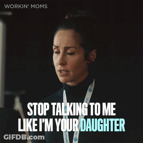 A Woman With A Lanyard That Says Workin ' Moms GIF