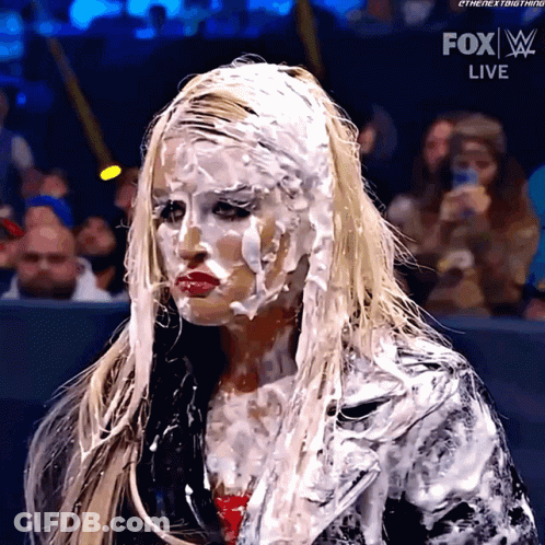 A Woman With A Lot Of White Icing On Her Face Is On Fox Live GIF