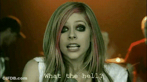 A Woman With A Microphone And The Words What The Hell GIF