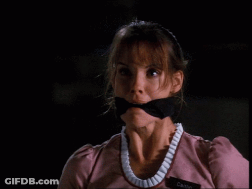 A Woman With A Name Tag That Says Cait GIF