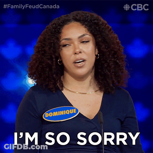 A Woman With A Name Tag That Says Dominique Is Saying " I 'M So Sorry " GIF