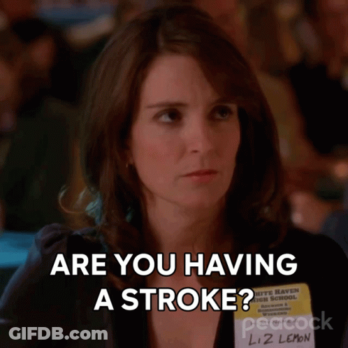 A Woman With A Name Tag That Says Liz Lemon On It GIF
