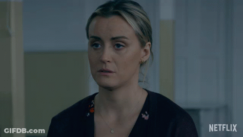 A Woman With A Necklace And Earrings Is Featured On Netflix GIF