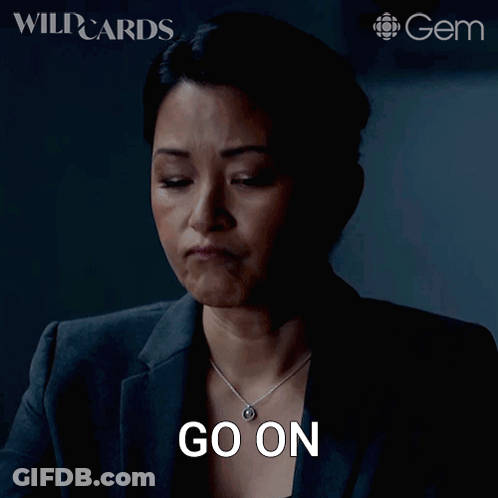 A Woman With A Necklace Says Go On GIF