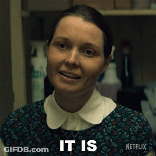 A Woman With A Netflix Logo On Her Sleeve GIF