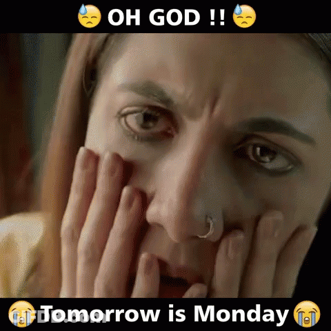 A Woman With A Nose Ring Is Covering Her Face With Her Hands And Crying Because Tomorrow Is Monday . GIF