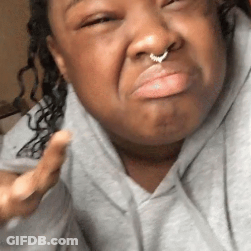 A Woman With A Nose Ring On Her Nose GIF