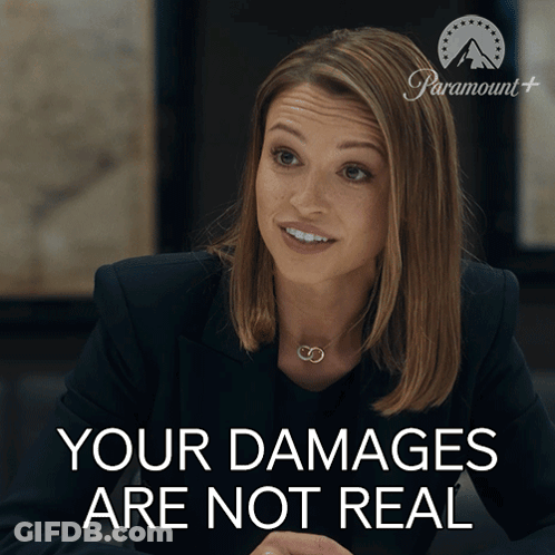 A Woman With A Paramount Logo Behind Her That Says Your Damages Are Not Real GIF