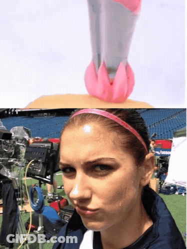 A Woman With A Pink Headband On Has A Pink Object On Her Head GIF