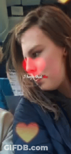 A Woman With A Red Nose And The Words " I Hope That She " GIF