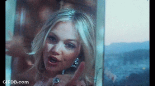 A Woman With A Ring On Her Finger Giving The Middle Finger GIF