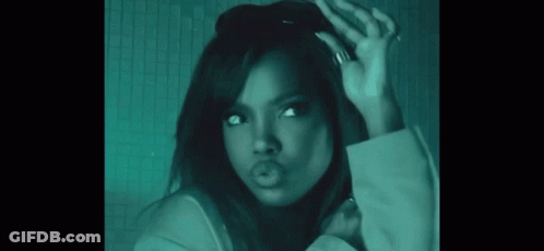 A Woman With A Ring On Her Finger Is Making A Face GIF