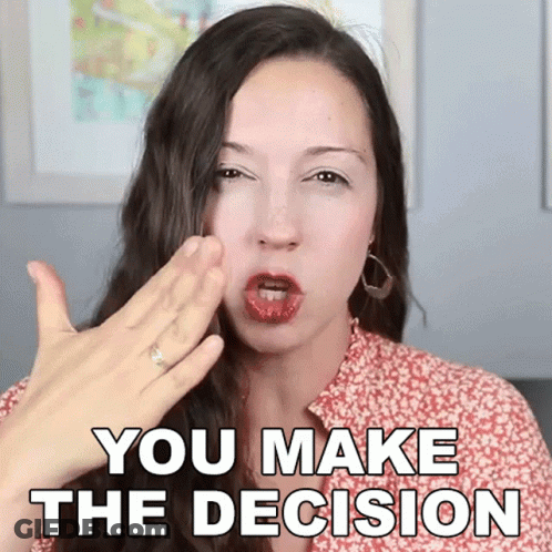 A Woman With A Ring On Her Finger Is Making A Gesture That Says You Make The Decision GIF