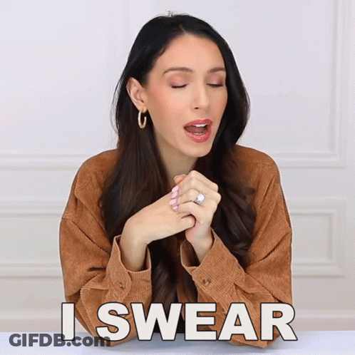 A Woman With A Ring On Her Finger Is Making A Swear Gesture GIF