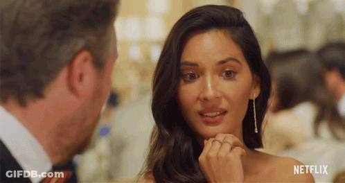 Woman With Ring Looking At Man With Netflix GIF