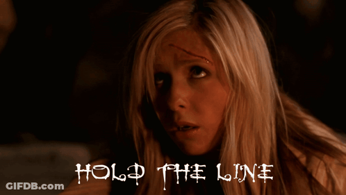 A Woman With A Scar On Her Forehead And The Words Hold The Line On The Bottom GIF