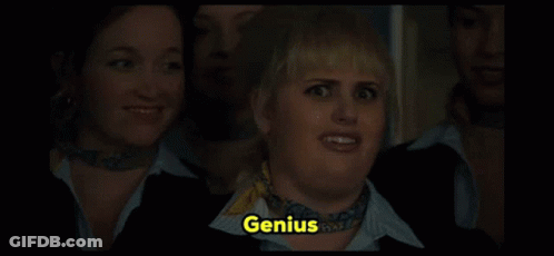 A Woman With A Scarf Around Her Neck And The Word Genius On Her Face GIF