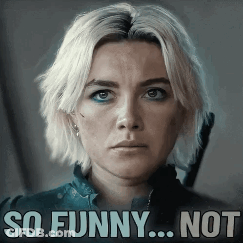 A Woman With A Serious Look On Her Face With The Words So Funny Not Written Below Her GIF