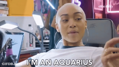 A Woman With A Shaved Head Is Getting A Tattoo And Says " I 'M An Aquarius " GIF