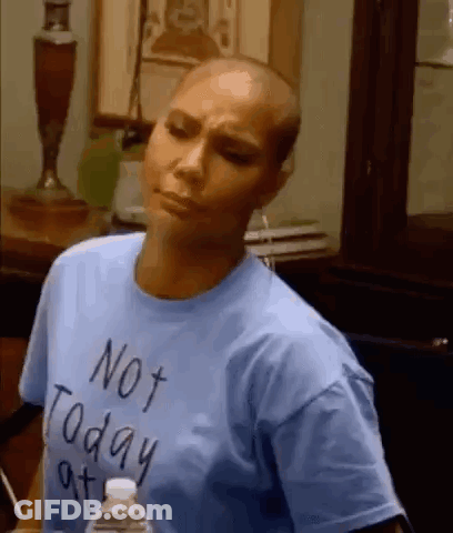 A Woman With A Shaved Head Is Wearing A Blue T-Shirt That Says Not Today At . GIF