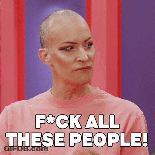 A Woman With A Shaved Head Is Wearing A Pink Shirt That Says F * Ck All These People GIF