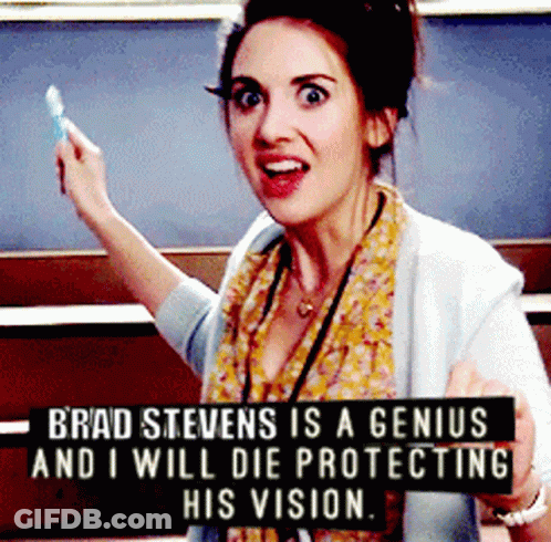 A Woman With A Sign That Says Brad Stevens Is A Genius And I Will Die Protecting His Vision GIF