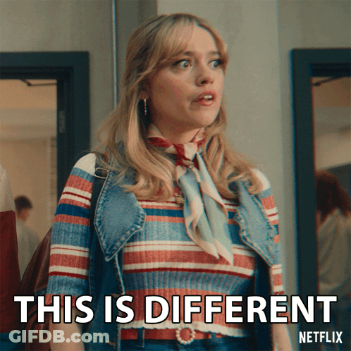 A Woman With A Striped Shirt And A Denim Vest Says This Is Different GIF